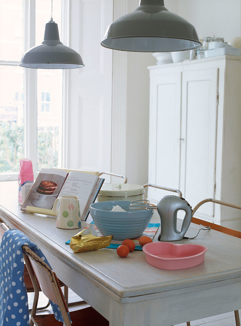 Kitchen table with caking making ingredients displayed