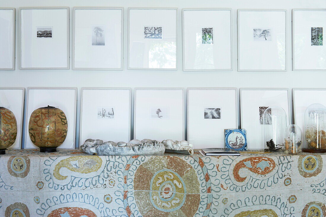 Framed artwork displayed on side table in Massachusetts home, New England, USA