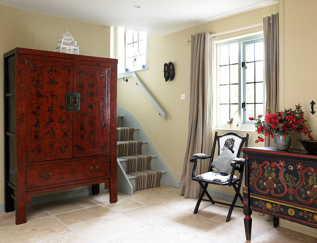 Hall with Oriental furniture and stone floor