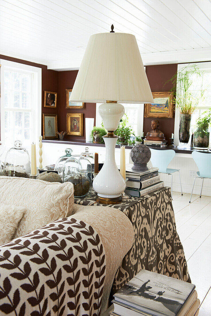 Large lamp with patterned fabrics in living room of Austerlitz home, Columbia County, New York, United States