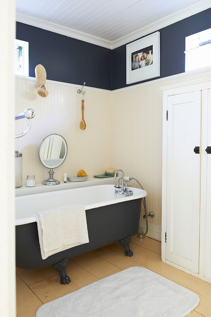 Dark grey and cream bathroom with freestanding bath, Austerlitz, Columbia County, New York, United States