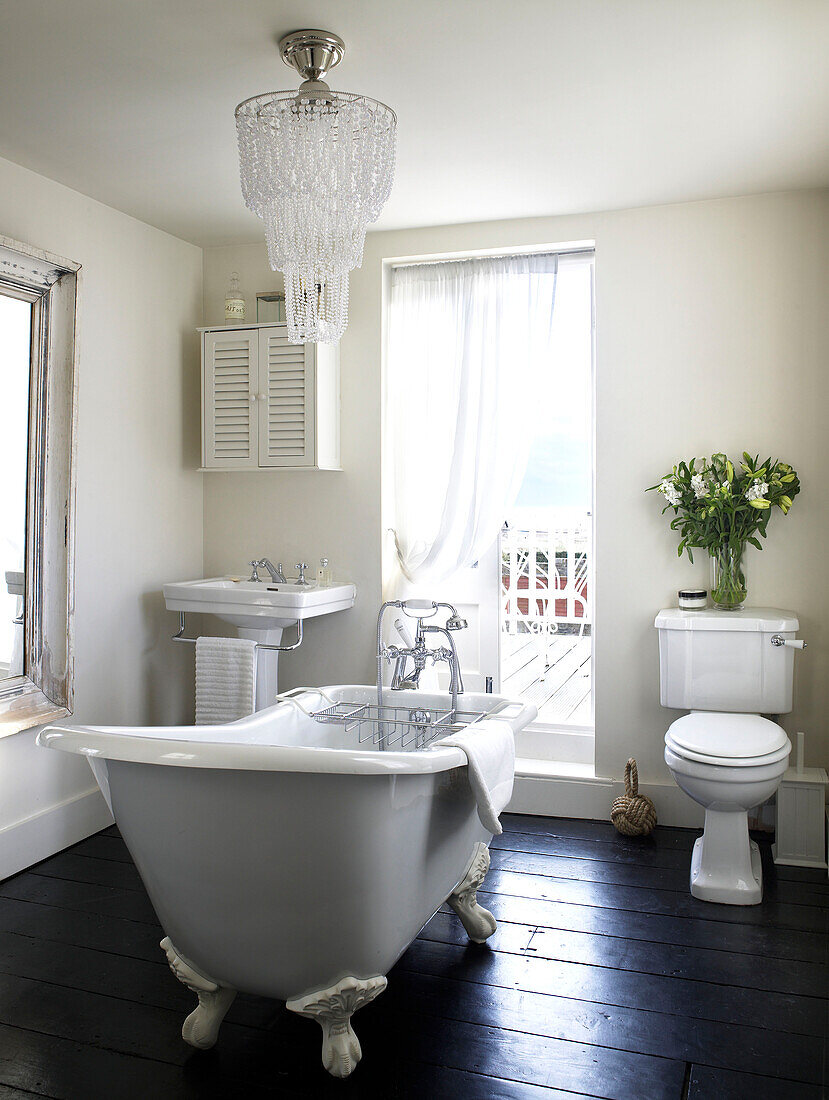 Bathroom with roll top bath