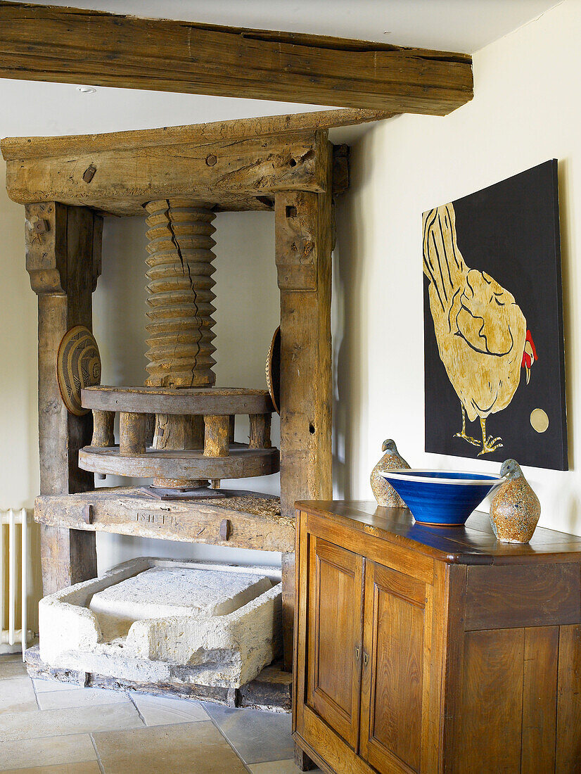 Old fashioned wooden machine in dining room