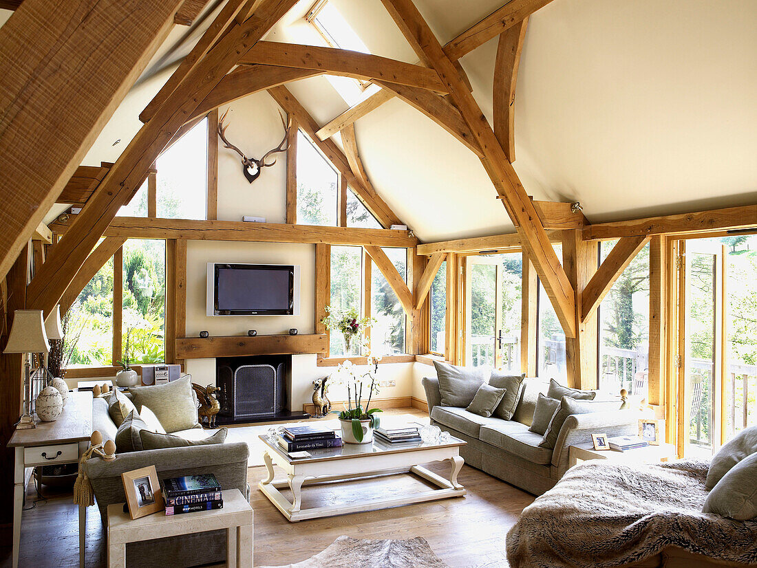 Open plan timber framed living room in Somerset new build in rural England UK