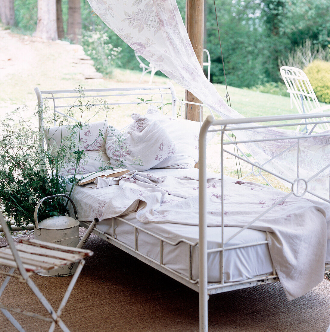 Vintage style daybed in garden summer house