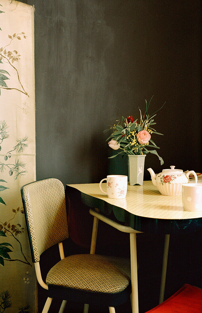 Kitchen dining table and chair with crockery