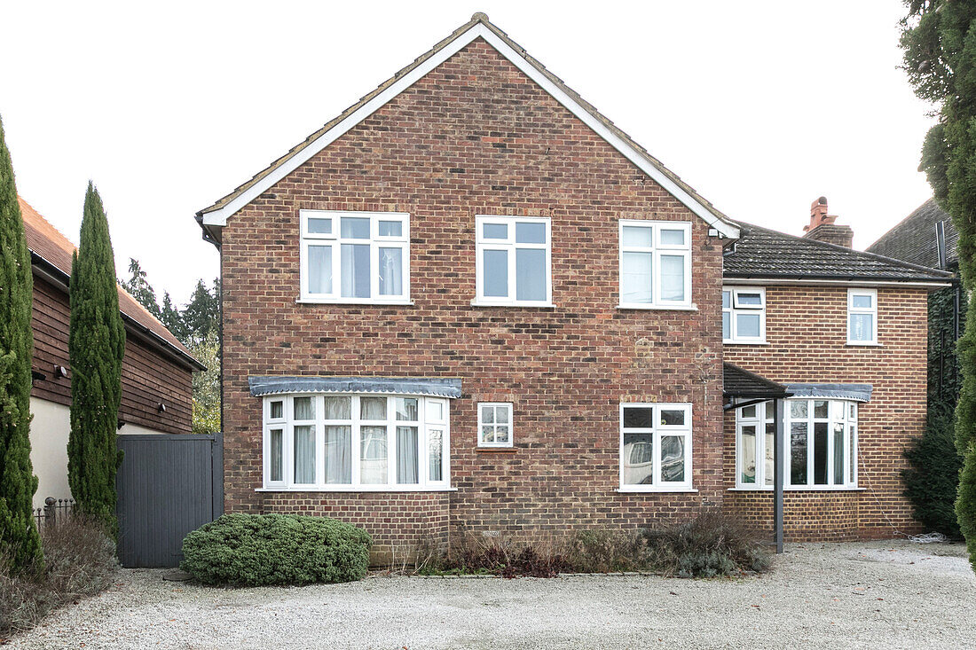 Brick exterior of detached Farnham home Surrey England UK