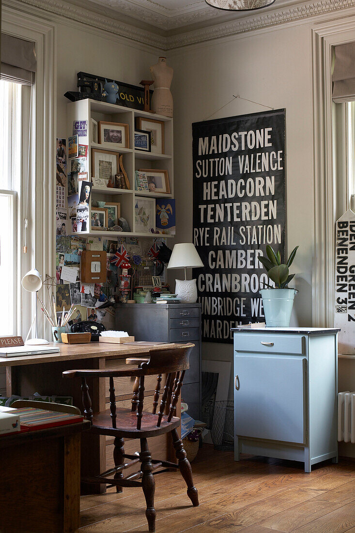 Chair at desk with bookshelf and storage units East Sussex