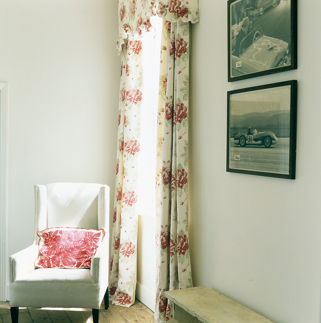 Armchair and floral curtains