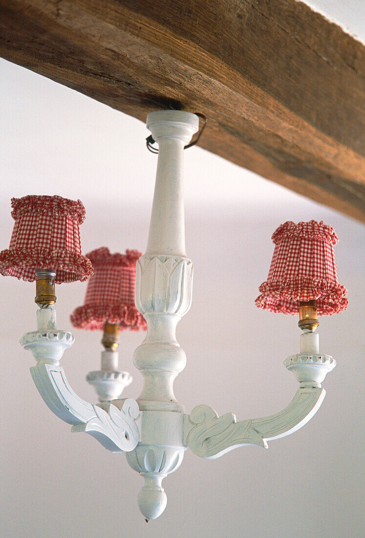 Carved wood chandelier