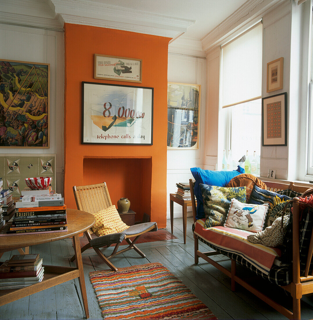 White and orange sitting room with modern antique furniture 