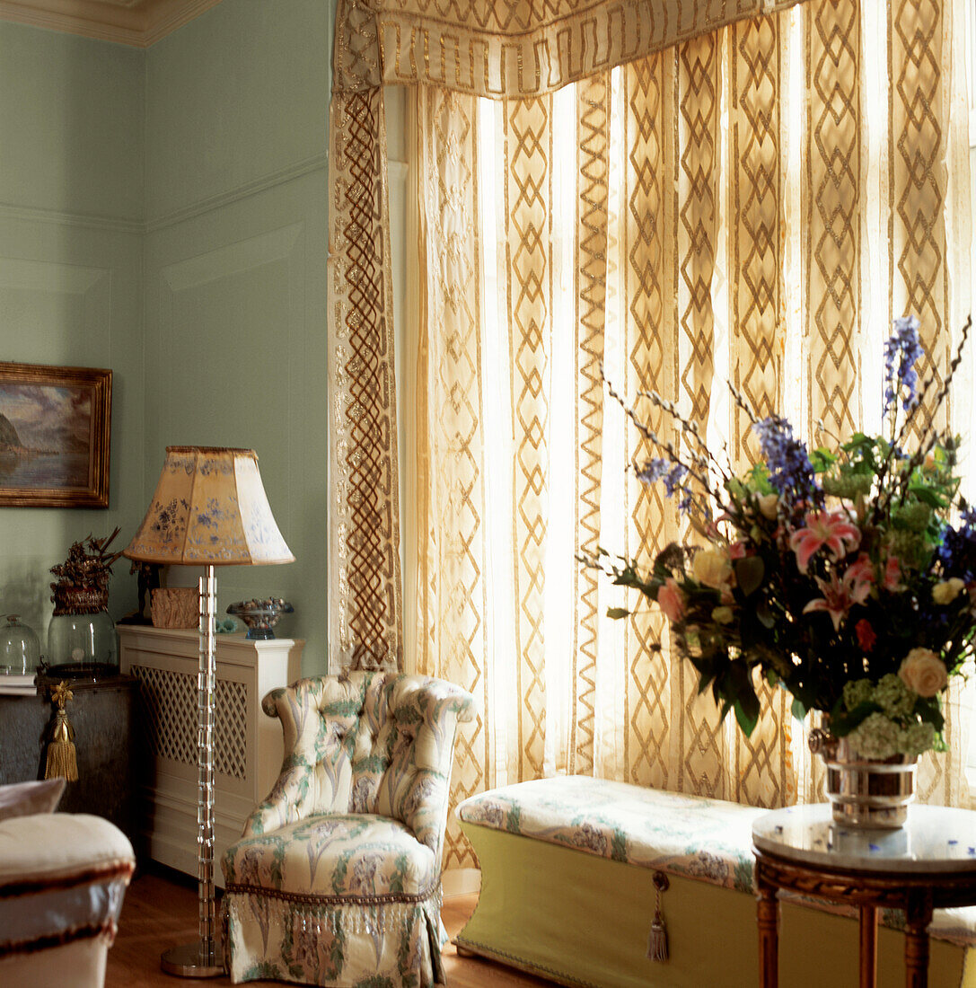 Living room detail with Portuguese church hangings used as a window treatment