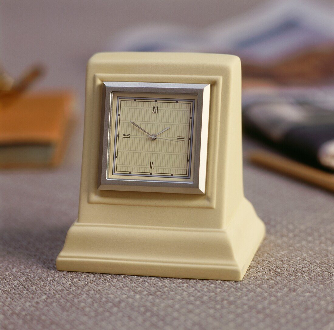 Close up of cream coloured alarm clock