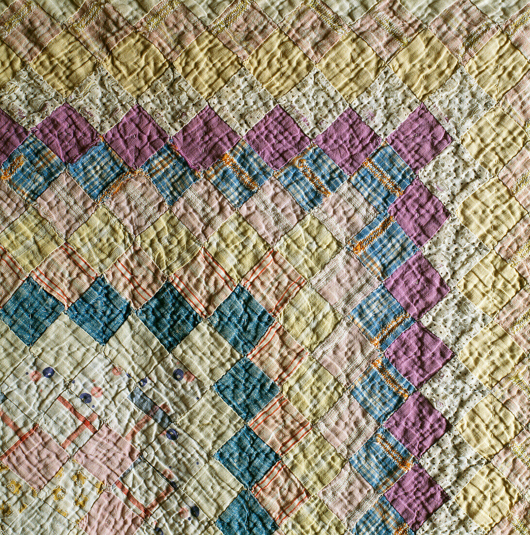 Multi-coloured patchwork quilt