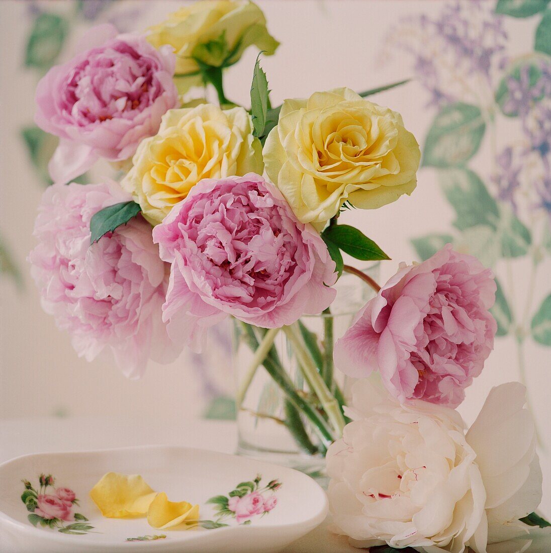 Pretty floral bouquet with yellow roses and pink peonies