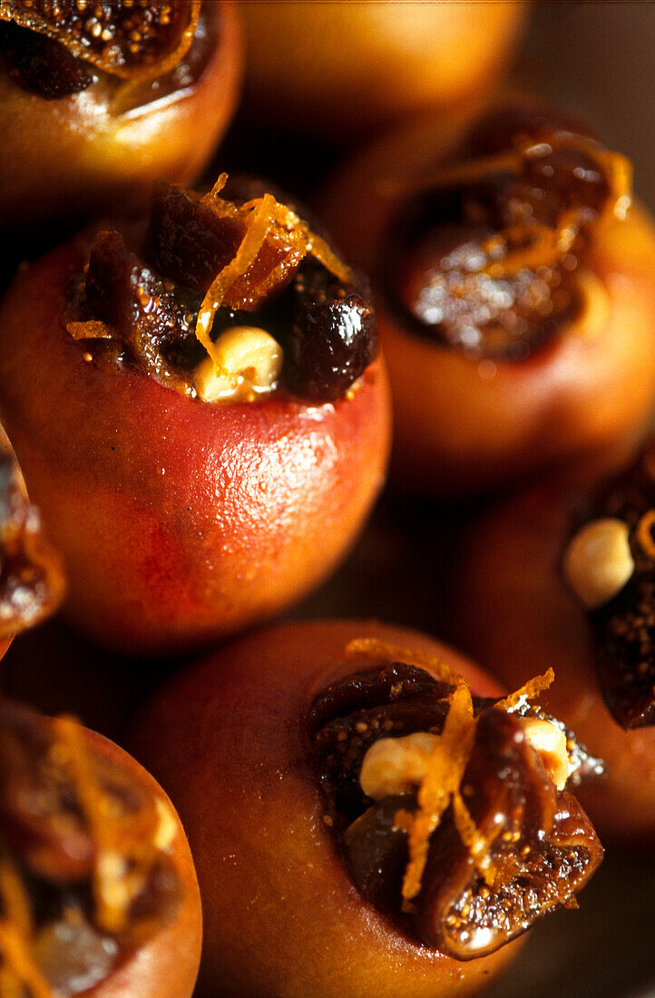 Baked peaches stuffed with spices dried fruit figs and ginger
