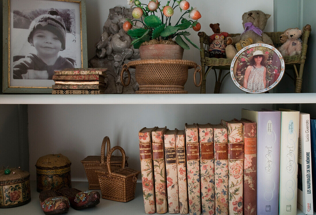Books and photos on shelf