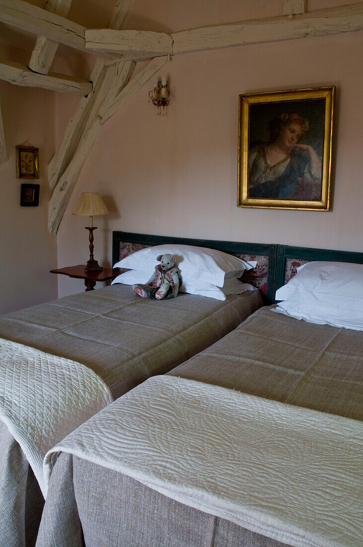 Rustic bedroom with painting on wall