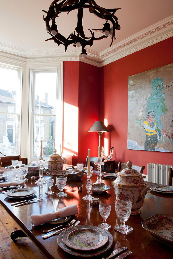 Vintage chinaware on set dining table in Greenwich home,  London,  England,  UK