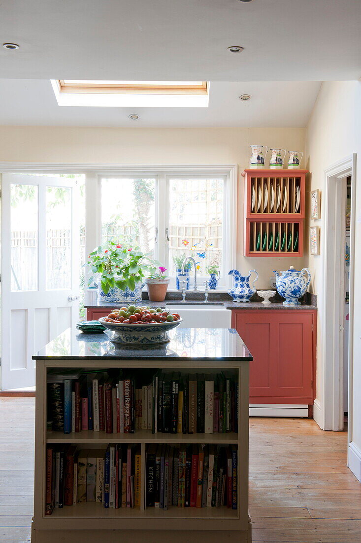 Book storage in kitchen island of Greenwich home,  London,  England,  UK