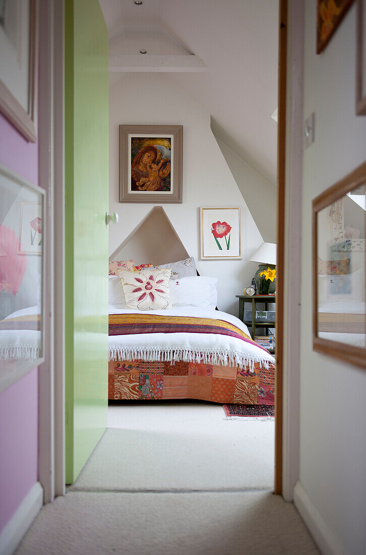 View through green doorway to bedroom in Lewes home,  East Sussex,  England,  UK