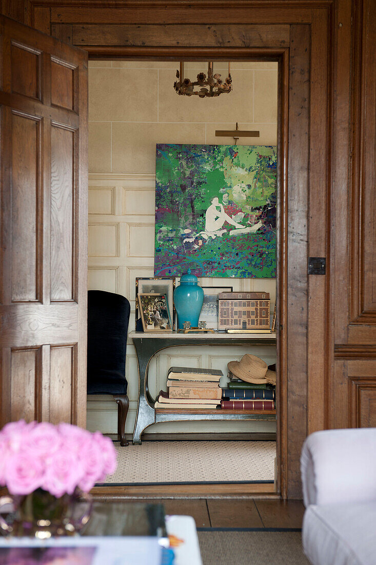 View through wood panelled doorway to hallway of Tiverton country home,  Devon,  England,  UK