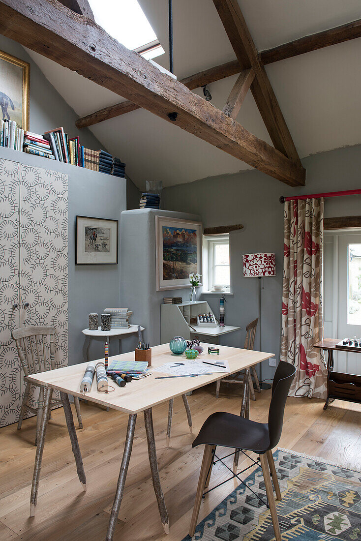 Desk and chair in light green Oxfordshire barn conversion  England  UK