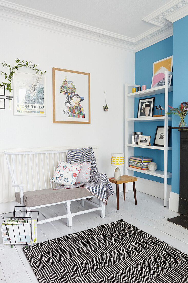 Shelving unit and seating with black and white rug in Sheffield home  Yorkshire  UK