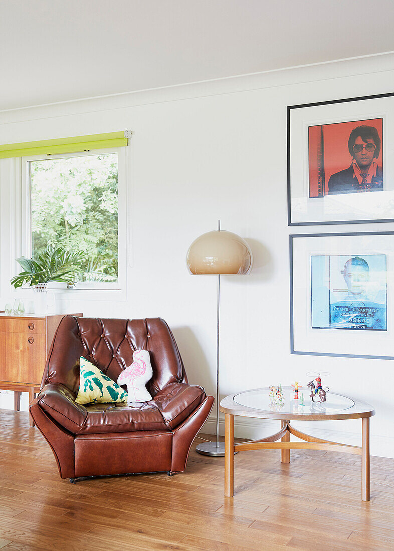 Vintage leather armchair and lamp with side table in East Riding of Yorkshire  England  UK