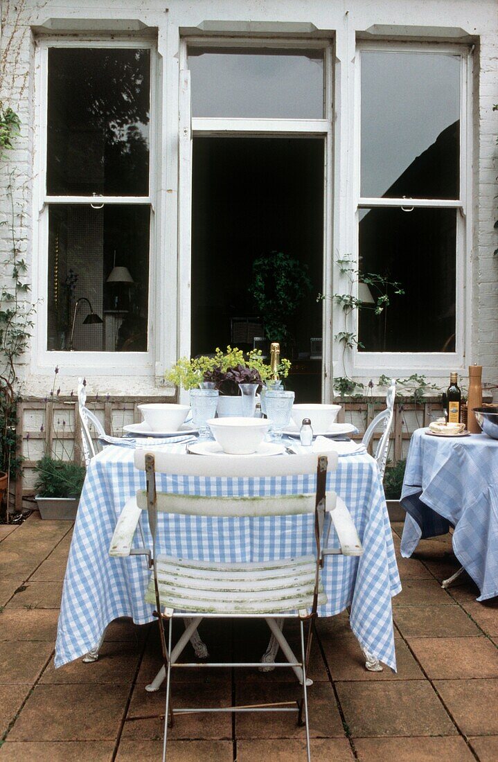 Table setting on patio terrace 