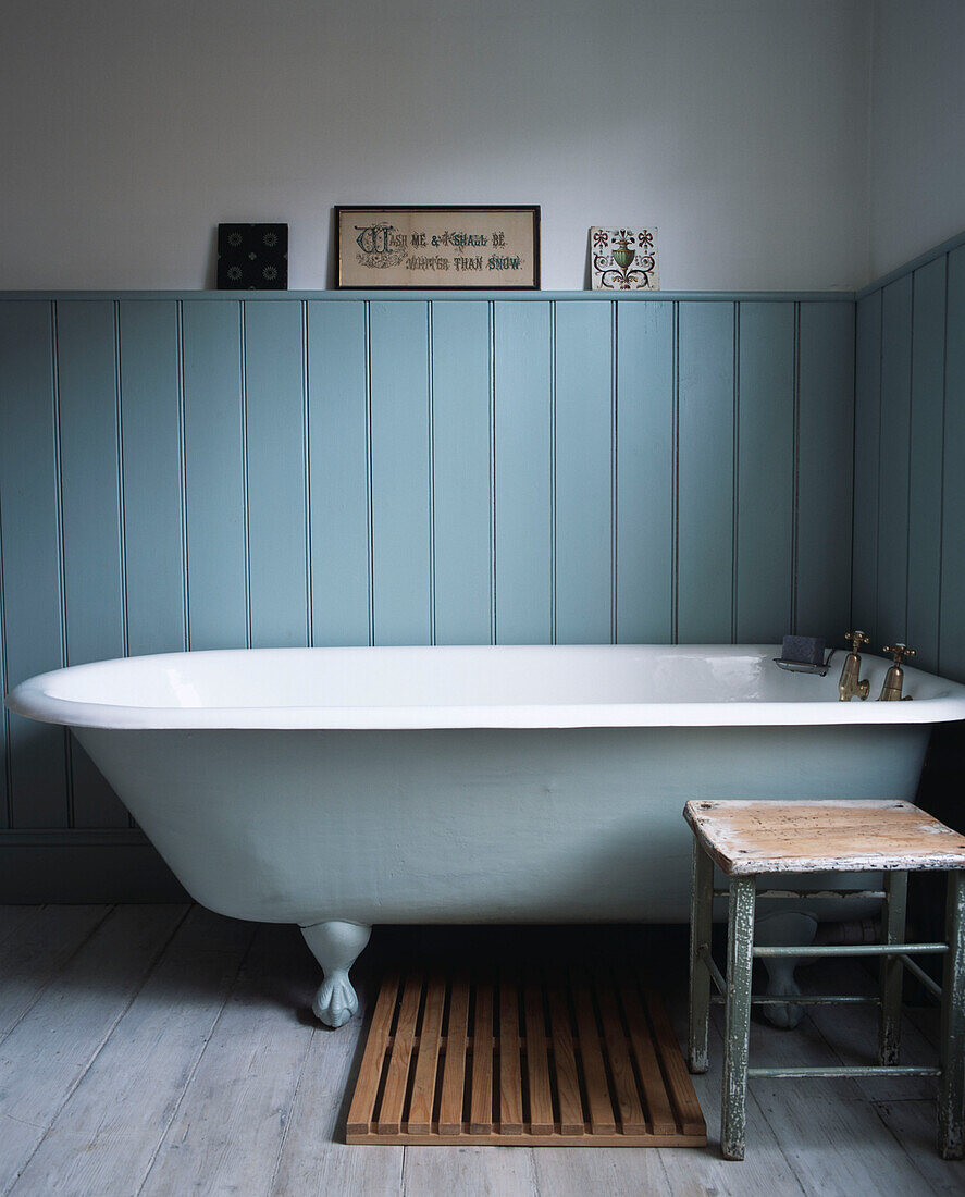 Simple bathroom with free standing bathtub