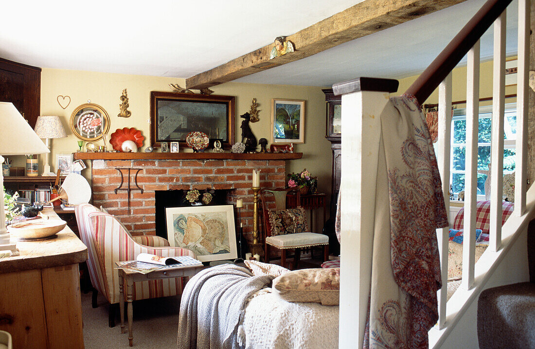 Suffolk cottage living room with exposed brick fireplace