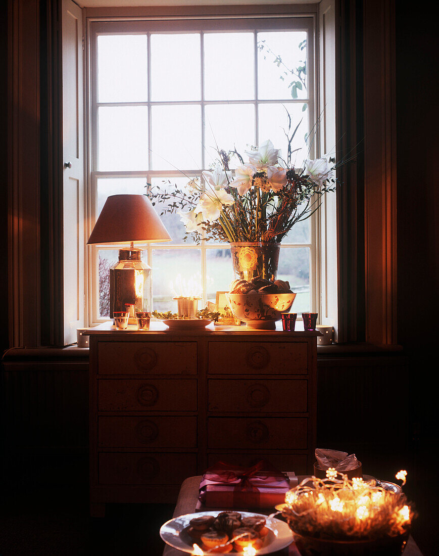 Illuminated interior with bouquet of flowers