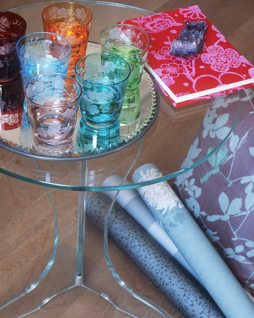 Floral patterns glasses on glass table