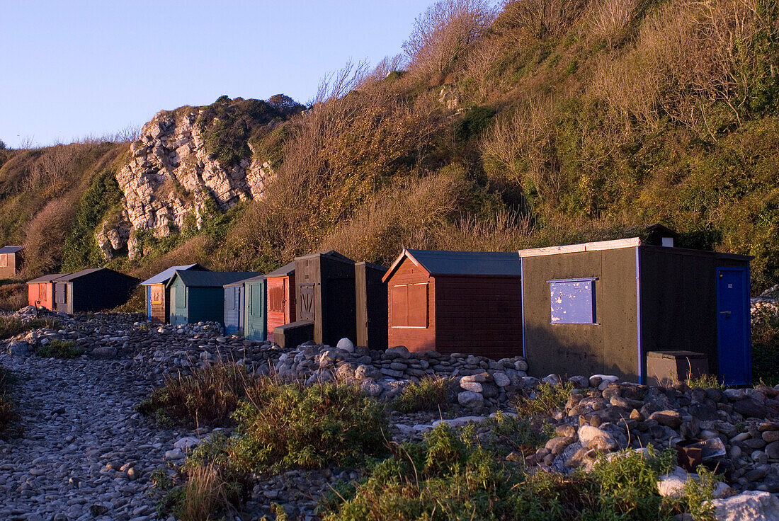 Beach huts on beach Portland Dorset UK