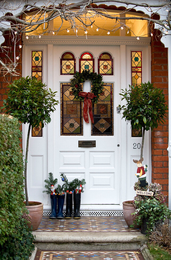 Front door decorated for Christmas