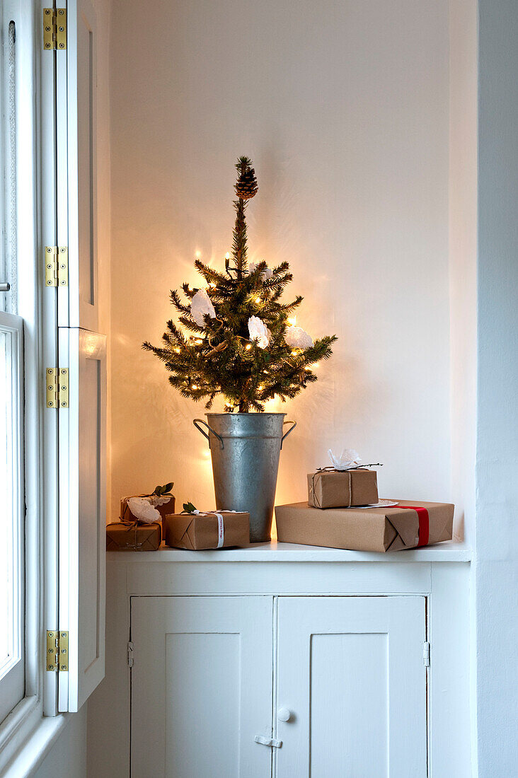 Christmas tree with gift wrapped presents in Richmond-on-Thames London