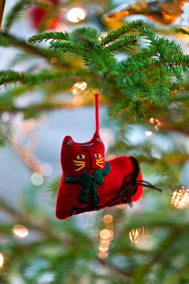 Red felt cat, tree ornament, Walberton, West Sussex, England, UK