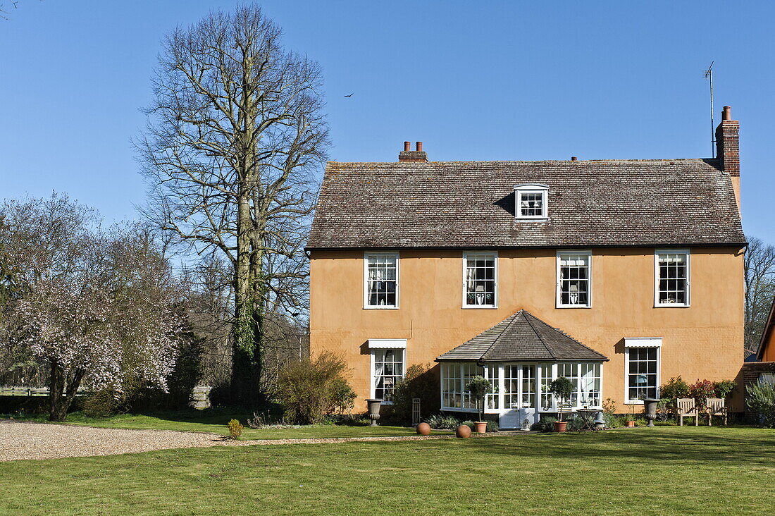 Detached home exterior with conservatory in Bury St Edmunds, Sussex, England, UK