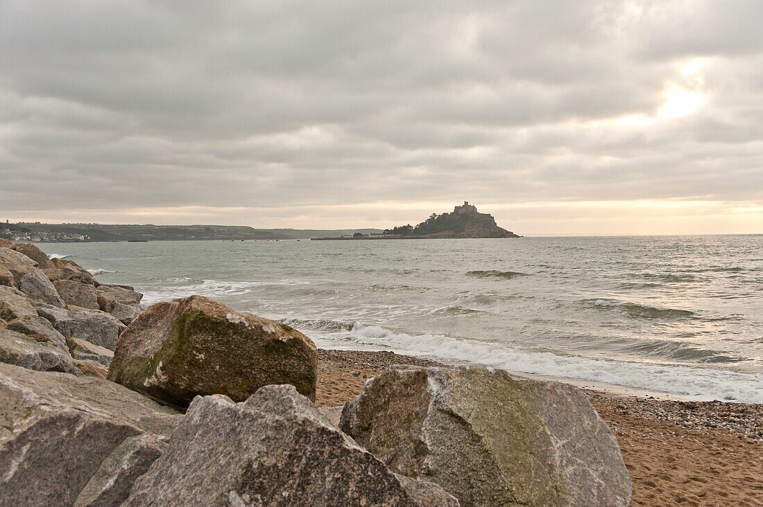 Boulders on beach with view to sea Penzance Cornwall England UK