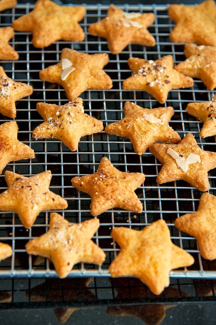 Star shaped pastries on baking tray in Christmas in Wadebridge home, North Cornwall, UK