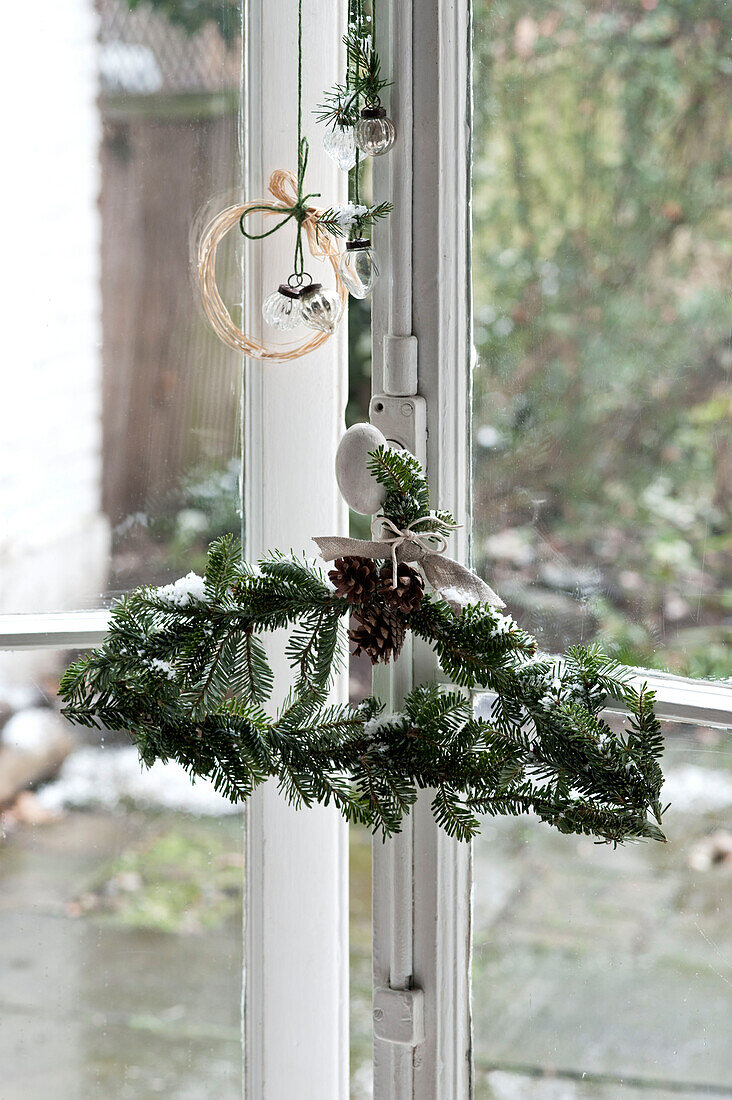 Wire coat hanger made into an unusual alternative to a traditional wreath