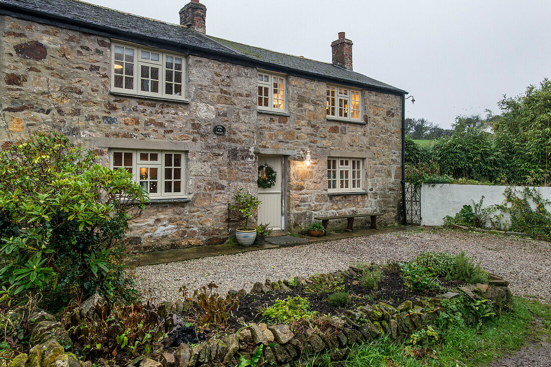 Gravel driveway of granite and slate Georgian cottage St Erth Cornwall UK