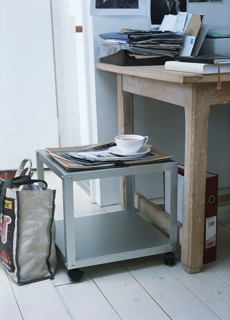 Shelf and bag near the table