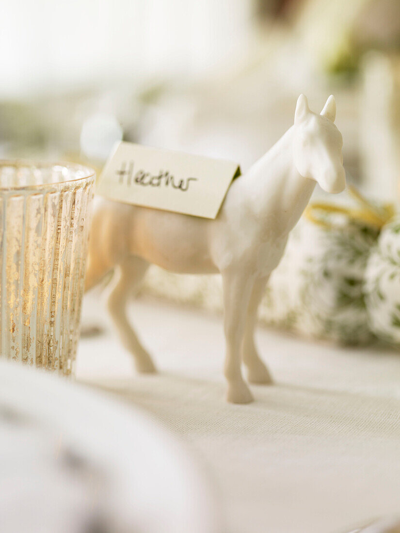 Name card on horse as table decoration