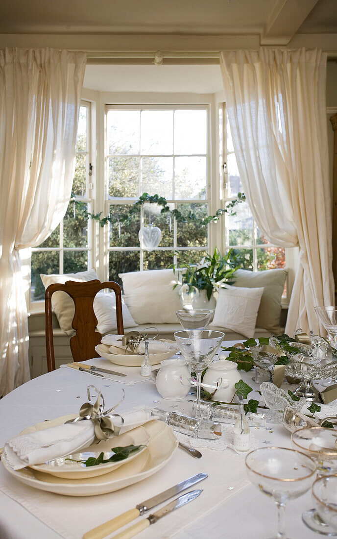 PLace setting at Christmas dinner table in Tenterden home, Kent, England, UK