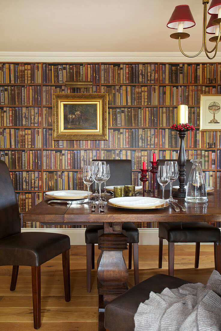 Dining room with trompe l'oeil bookcase in Smarden home Kent England UK