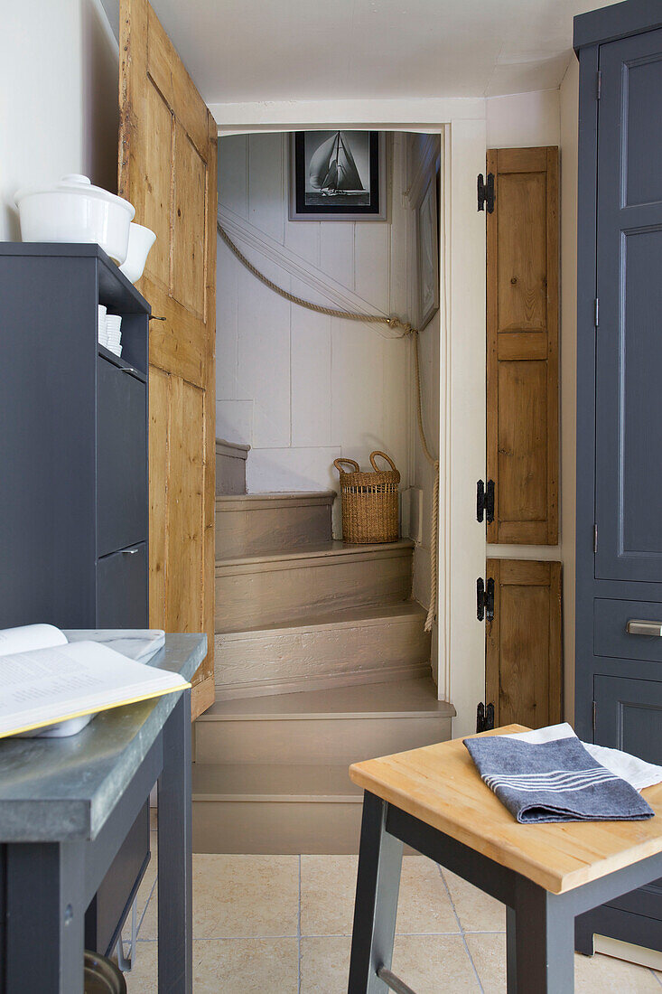 Kitchen detail with painted staircase in Old Town home Portsmouth England UK