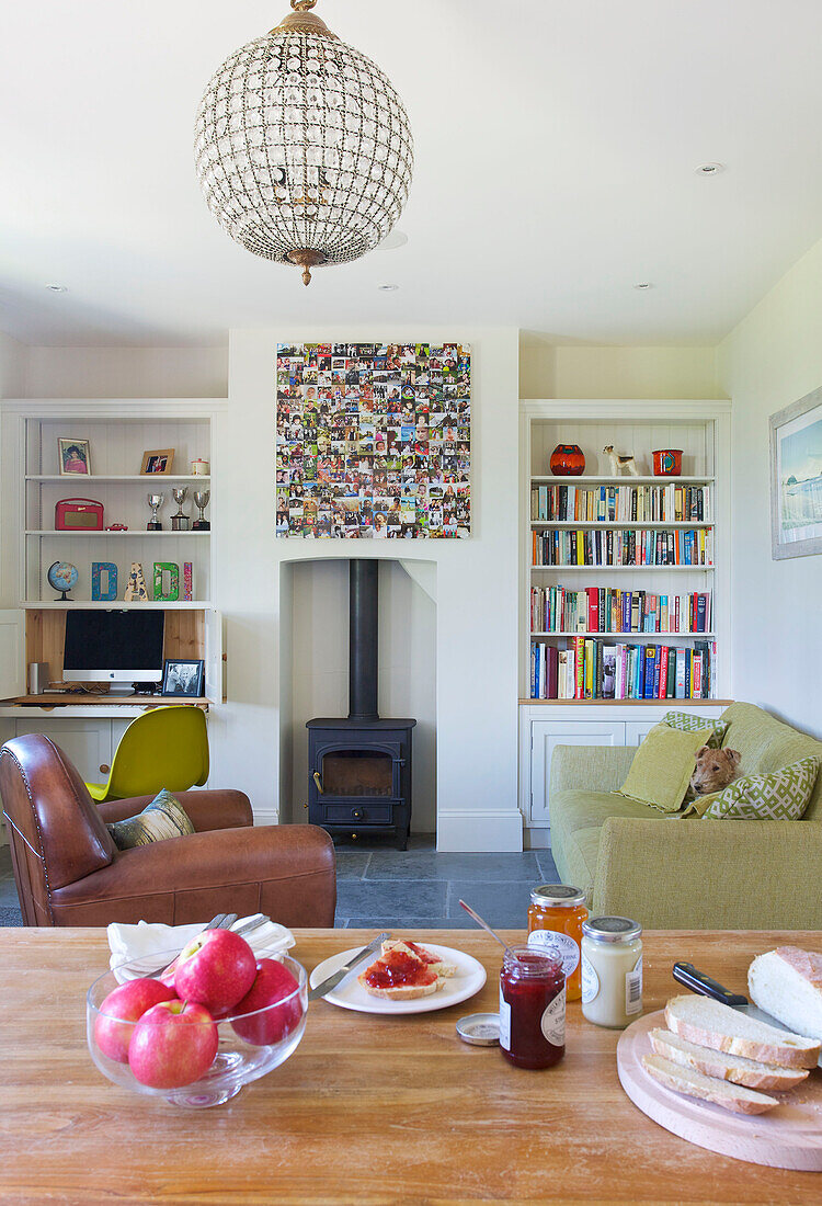 OPen plan living and dining room with bookshelves in Woodchurch home Kent England UK