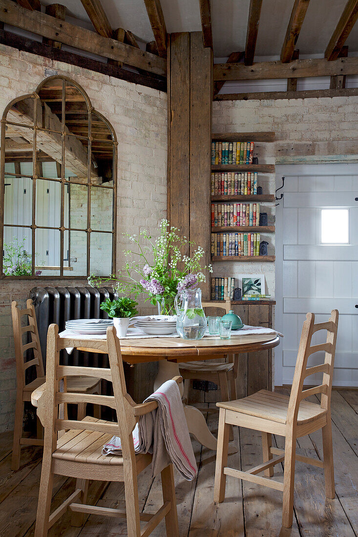 Arts and crafts table and chairs in Grade ll listed windmill conversion Kent UK